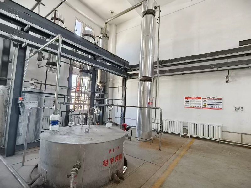 Distillation column, receivers and transfer pumps inside the workshop