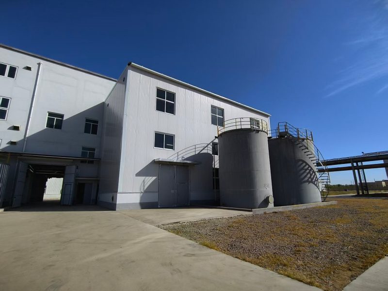 Storage tanks beside the production building